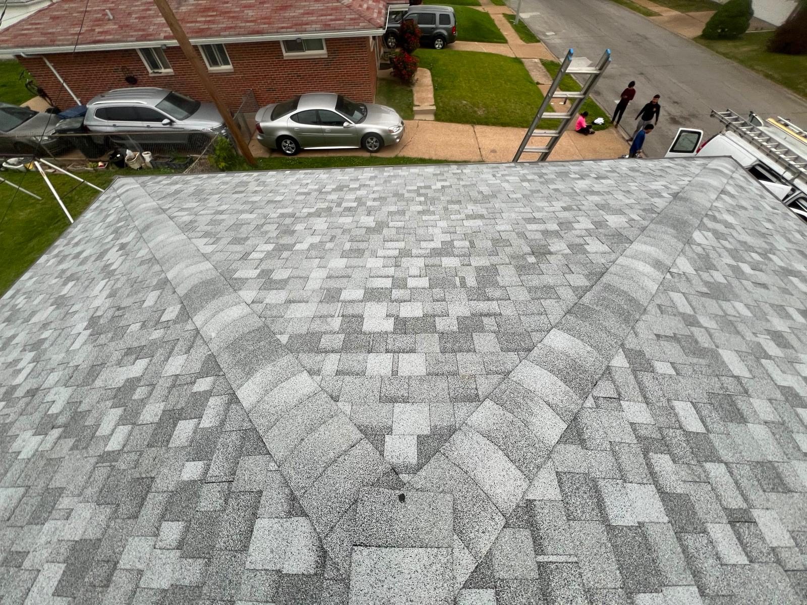 Aerial view of a finished complex hip roof after a Chesterfield, Missouri roof replacement